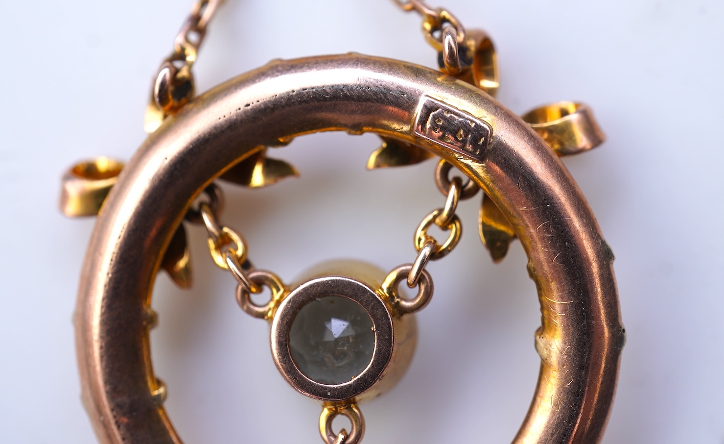 An Edwardian seed pearl and aquamarine pendant, circa 1910